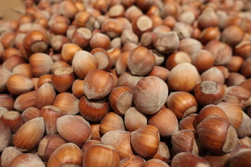 Hazelnuts in a grocery store, closeup, background