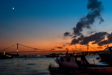 Istanbul, Turkey, 20 August 2015: Sunset, Boats and Bosphorus Bridge, Cengelkoy