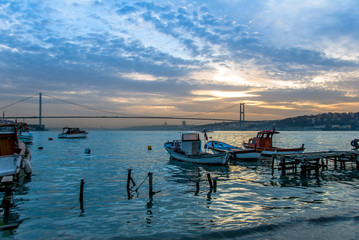 Fototapeta premium Istanbul, Turkey, 22 March 2006: Boats and Bosphorus Bridge, Cengelkoy
