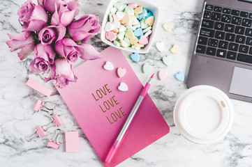 valentine desktop with roses,candy,and a journal for love notes
