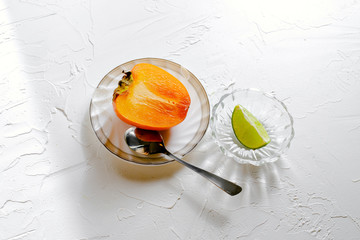Persimmon Slices on White Background