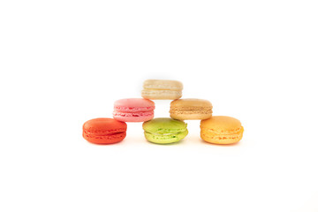 colourful macarons on white