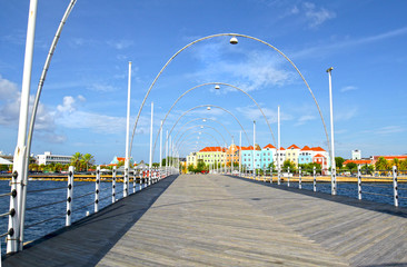 Willemstad, Curacao- Queen Emma Pontoon Bridge.  It is a swing bridge that opens to allow boats to enter St Anna Bay