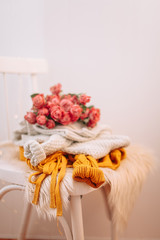 bunch of flowers in vase on wooden table