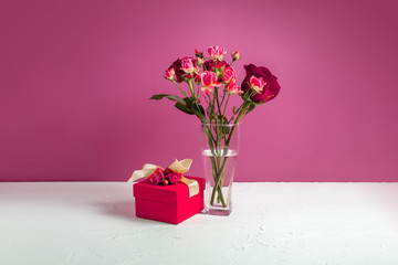 Vase with roses on the table
