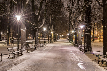 Planty park in the snow, winter night, Krakow, Poland