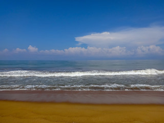 Scenic view of the Indian ocean against blue sky in Kalutara, Sri Lanka