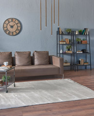 Modern living room, grey room, interior, leather brown sofa, clock and lamp design.