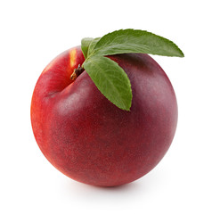 Peache or nectarine with leaf isolated on white