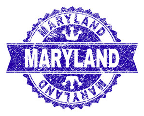 MARYLAND rosette stamp seal watermark with distress style. Designed with round rosette, ribbon and small crowns. Blue vector rubber watermark of MARYLAND title with unclean style.