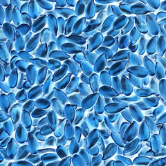 Blue seeds on a white, abstract texture