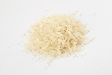 Pile of white rice on a white background