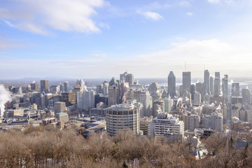 Scenic beautiful aerial view of Montreal. Depressive winter look of the largest megapolis city of Quebec in Canada 