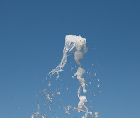 A jet of water is directed. Beats under pressure.