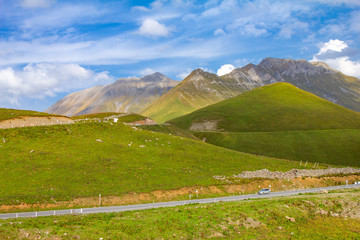 Beautiful view of the landscape of the Georgian military road on a Sunny summer day. The road connects the city of Vladikavkaz, Russia and Tbilisi, Georgia.