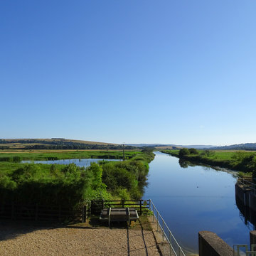 Eastern Yar River flood plain in lush green countryside, St Helens, Isle Of Wight, UK