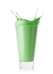 A glass of green smoothie or yogurt with splash