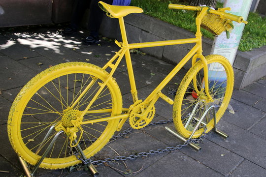 This bright yellow bicycle certainly attracts attention.