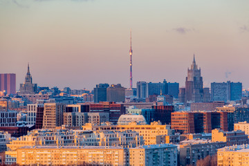 Panorama of evening Moscow. Winter landscape. Ostankino TV tower on the horizon.