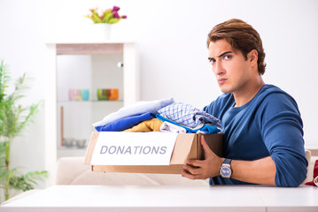 Concept of charity with donated clothing