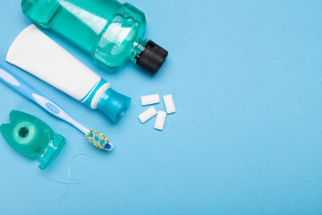 Tools for dental care: orthodontic brush, floss, toothpaste. Invisible dental aligners modern tooth...