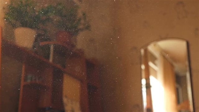 Flying dust in the air. Slow motion. Close-up. Bokeh video