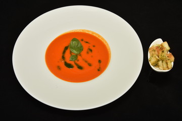  plate with red -orange sauce, salsa sauce,Taco sauce with basil