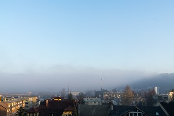 Fototapeta na wymiar Misty morning in the town. Slovakia