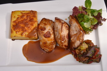 Roasted duck fillet with berry sauce and salad