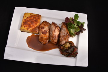 Roasted duck fillet with berry sauce and salad