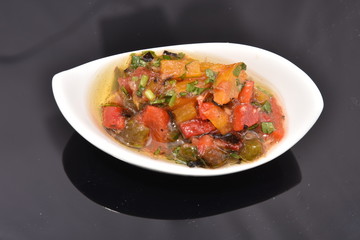 spicy sauce in a white bowl