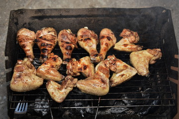 Chicken wings on barbecue grill 