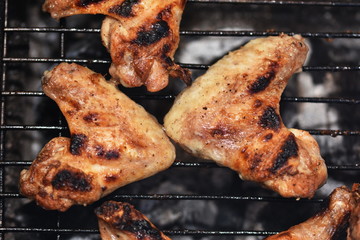 Chicken wings on barbecue grill 