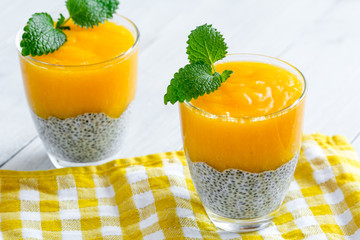 Chia seeds pudding with mango puree. Healthy breakfast. Sweet healthy dessert.