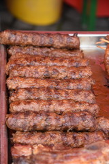 raw meat ,mici, mititei meat rolls