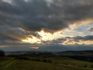 Obraz na płótnie Canvas Sunset and sunrise with dramatic colorful clouds. Slovakia 