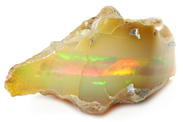 precious color flashing Ethiopian welo opal with rainbowlike fire isolated on white background