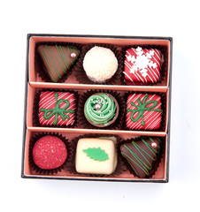 handmade chocolates in box on white background