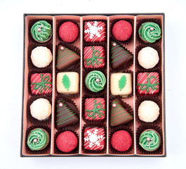 handmade chocolates in box on white background
