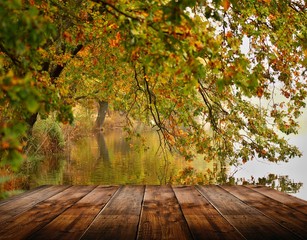 Naklejka na ściany i meble wooden deck table in autumn nature