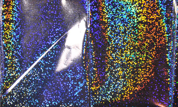 Texture of holographic foil.
