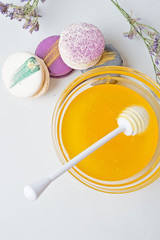 fresh natual  honey in glass bowl with honey spoon
