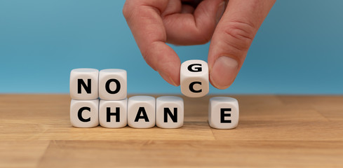 No change, no chance. Hand turns a dice and changes the expression "no change" to "no chance" © Frank H.