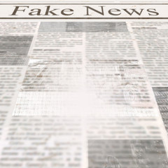 Fototapeta premium Newspaper with headline Fake News and old unreadable text