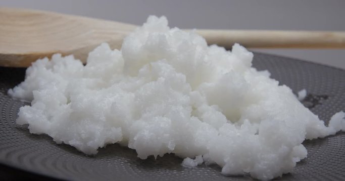 Coconut oil rotating studio close-up