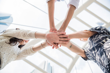 Obraz premium Friends join hand together
