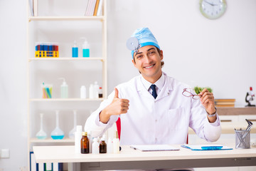 Young male doctor otolaryngologist working at the hospital 