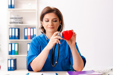 Female doctor cardiologist working in the hospital 