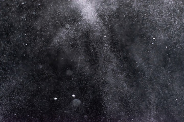 abstract splashes of water on a black background - Image