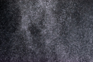 abstract splashes of water on a black background - Image